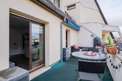 Petit Oasis à Strasbourg (Petit Oasis a Strasbourg) in แลงโกชาร์ม