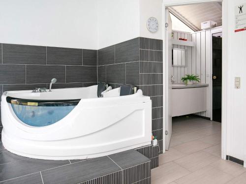 Spa, 8 person holiday home in Løkken in Lokken