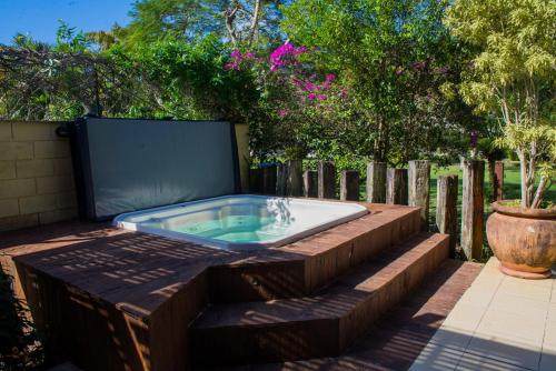 Garden, Casa Espetacular com Jacuzzi Churrasqueira e WIFI in Praia Do Guaeca