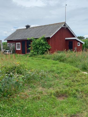 Stuga på gård i Böda socken (Stuga pa gard i Boda socken) in Mellböda
