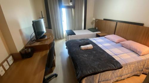 UH 406 - 3 Pessoas e garagem