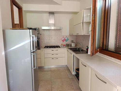 Relax nel verde a 5 minuti dal mare in appartamento dentro villa con giardino in มิซาโน อดริอาติโก