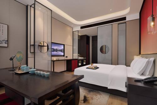 Moshangqingshe Hotel(Zhengzhou Erqi Wanda Plaza and Hanghai Road)