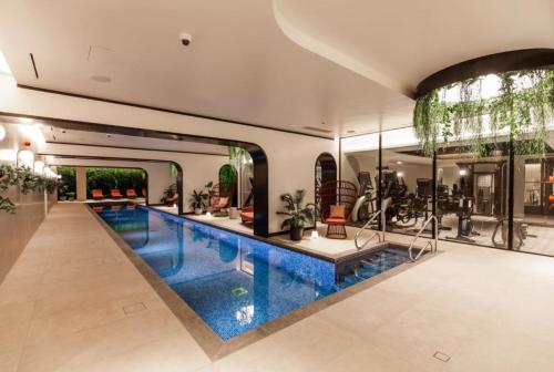 Luxe Apartment in M1 with Pool, Gym & Spa, Manchester (Foto 4)