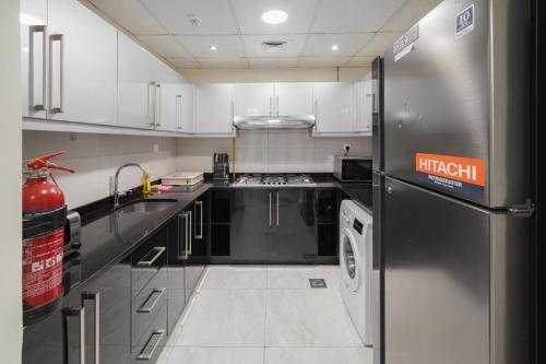 Family-Sized 4BR I Pool, Jacuzzi & Gym, Dubai (Foto 6)