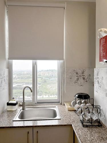 ห้องครัว, Cozy 1BR Designer Apartment, Gulberg Greens in โปลิสฟาวเดชั่น