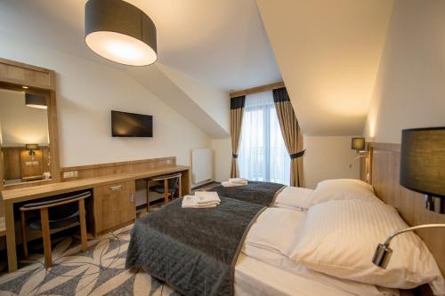 Grand Stasinda Bal Sylwestrowy Animacje Własny Stok Dwa Posiłki Bogaty Bufet Baseny Kręgielnia Grota Sauny Squash Siłownia Place Zabaw Widoki 1000mnpm obrázok