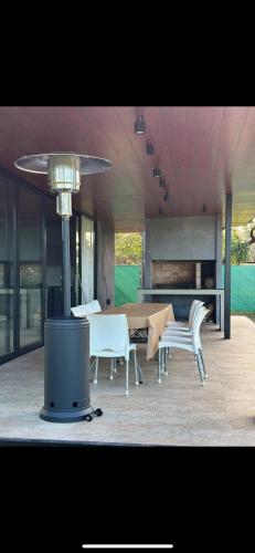 Facilities, Quincho y pileta para reuniones tranquilas en Roldan in Roldán