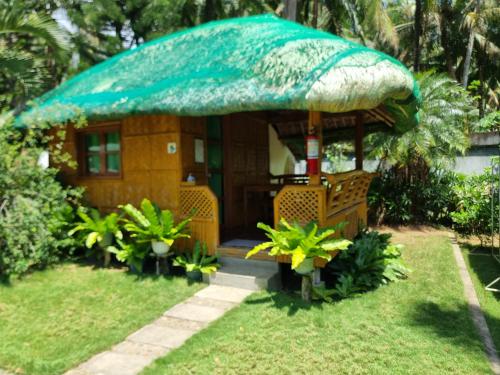 Nanay Santa's Garden Beach Resort in Bocboc