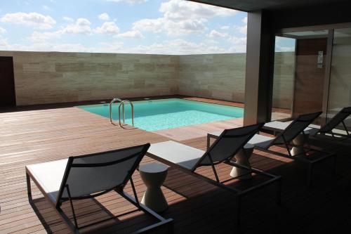 泳池, 斯誇爾斯克魯茲酒店 (Escuderos Hotel Cruz) in 阿爾加馬西利亞德卡拉特拉瓦