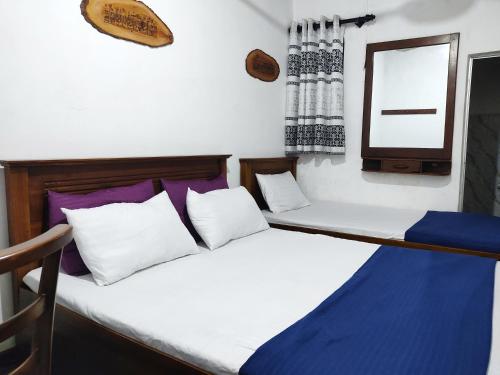 Green Holiday Inn in جامبولا