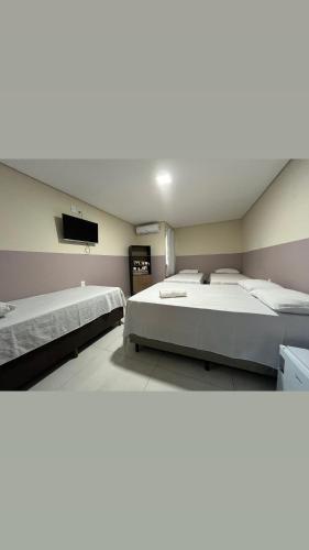 1 double bed, 3 twin beds