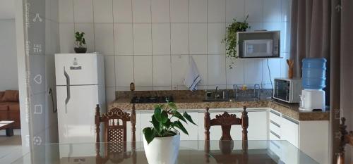 virtuve, Hospedaria em Lagoa - Residencial Cota - Quartos in Lagoa Da Prata
