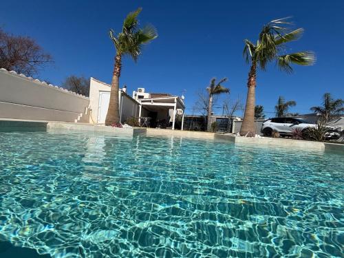house with pool, beach access by private road