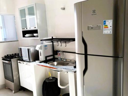 Kitchen, Oasis das Dunas in Parque Balneario Sao Francisco