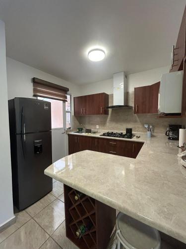 Casa con Alberca en condominio in San Juan