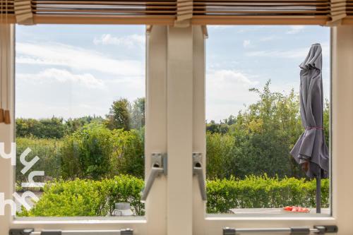 Gezellige vakantiewoning met een zonnig terras en weids zicht over polders bij Serooskerke in Serooskerke (Zeeland)