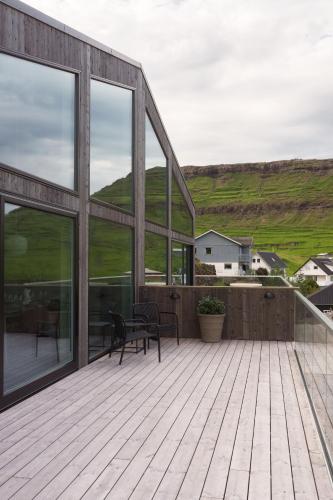 Näkymä ulkoa, Hotel Vík - 3 BR Wellness Townhouses with Sauna, Jacuzzi & Panoramic Views (Hotel Vik - 3 BR Wellness Townhouses with Sauna, Jacuzzi & Panoramic Views) in Gjogv