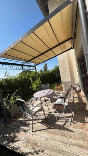 Erkély/terasz, Gemütliches 50qm Apartment mit Terrasse und Garten (Gemutliches 50qm Apartment mit Terrasse und Garten) in Eiselfing