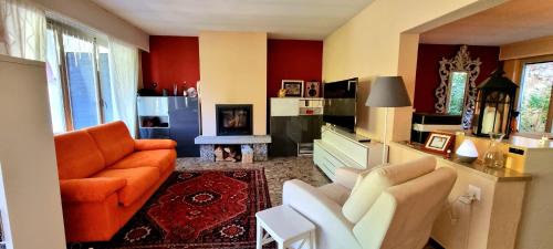 Skupni salon/TV območje, Einzelzimmer mit Gemeinschaftsbad -und Küchenbenutzung (Einzelzimmer mit Gemeinschaftsbad -und Kuchenbenutzung) in Croglio