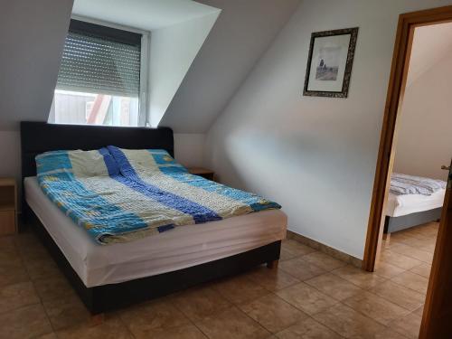 Ferienwohnung mit Pool, WLAN direkt am See 70qm in บาลาตองมาเรียฟูร์โด