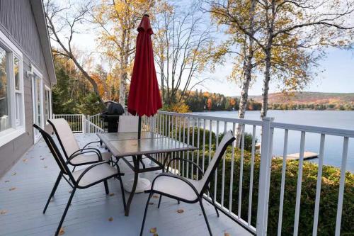 Waterfront with Spa and Lake Access in Saint-Damien (QC)