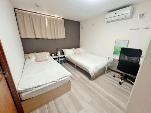 Asakusa Hanahi 102 Twin Bedroom 4 min walk to Asakusa Temple Direct subway access to Narita Haneda Airport Host's listings are all at the same address