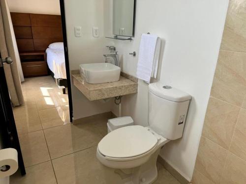 Casa Cómoda en Privada con Canchas y Alberca, Cancún (fotografie 10)