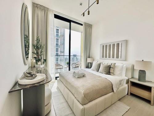 Cream Toned 1BR Suite with Parking Pool & Gym, Dubaï (photo 4)