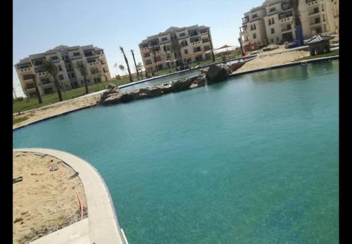 Arco Lagoon Private Garden Chalet Pool View North Coast I Alamein العلمين ا شاليه فاخر بحديقة خاصة ا مباشر حمام السباحة, El Alamein (fotografie 5)