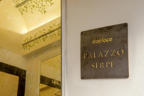 Palazzo Serpe Suites near Colosseum, Řím (fotografie 9)