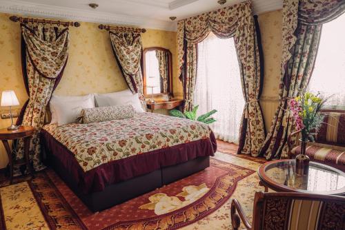 Erla Villa Boutique Hotel - Tap to explore photos