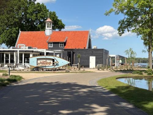 Restaurant, Nieuw! Sfeervol Tiny House in de natuur en aan het water in Hulshorst