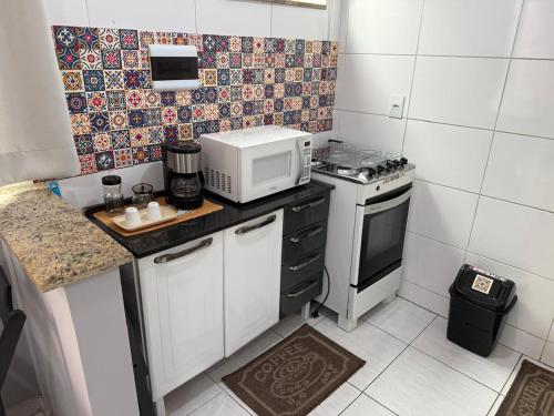 Apartamento prox a estacao, Vila Militar e Afonsos in Bento Ribeiro