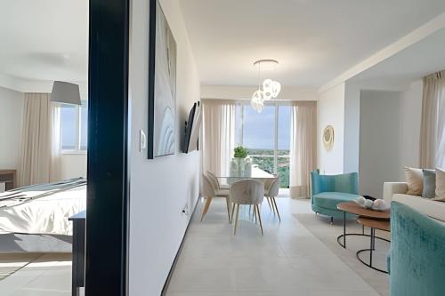 Beachside 1BDR Dreamy Apt.| BBQ + Pool & Sea View in Juan Dolio Town Center