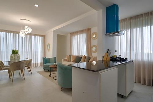 Beachside 1BDR Dreamy Apt.| BBQ + Pool & Sea View in Juan Dolio Town Center