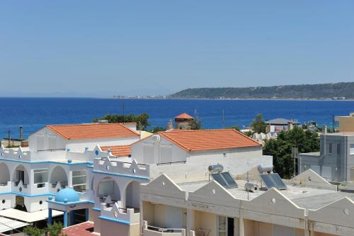 Heleni Beach Hotel Heleni Beach Hotel is conveniently located in the popular Ialysos area. The property offers a high standard of service and amenities to suit the individual needs of all travelers. Service-minded staff