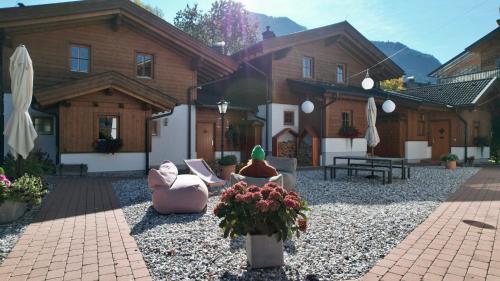Dorfchalets - Chalet Erni inkl Tauern Spa Therme Eintritt & Sommerkarte in คาบรุน