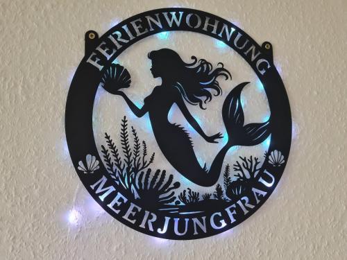 Meerjungfrau in Süssau, Deutschland
