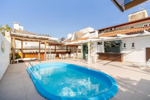 Duplex c/ piscina 800m da praia em Jurerê DME025