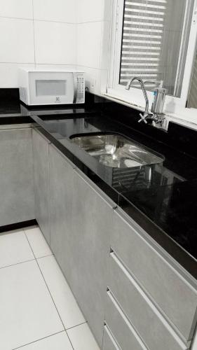virtuve, Recanto dos Ouros - Casa em Brasília com churrasqueira e localização privilegiada (Recanto dos Ouros - Casa em Brasilia com churrasqueira e localizacao privilegiada) in Gama (Federālais rajons)