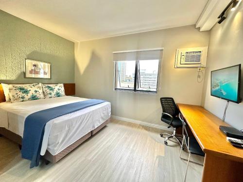 Design & Conforto: Flat Esquina da Av. Ibirapuera, São Paulo