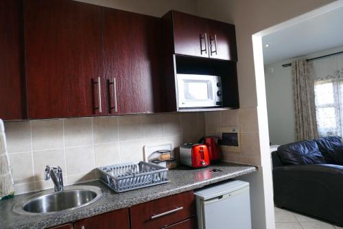 Konyha, The olive stay at Ocean view Villas F7 in Port Edward