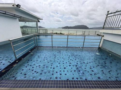 Familiar Comfy Simfoni Homestay near MARDI Langkawi Agro Technology Park