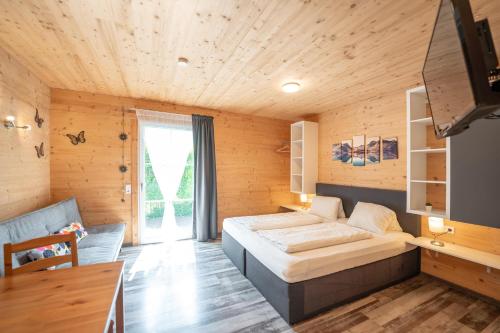 sala de TV, Gästehaus am Hahnenkamm (Gastehaus am Hahnenkamm) in Reutte