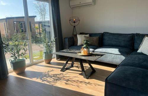 Shared lounge/TV area, Vakantiepark de Zeeuwse Parel - Zeebaars in Tholen