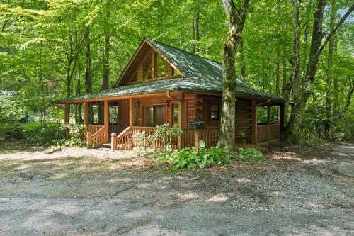 Cozy Creekside Cabin with Wraparound Porch home