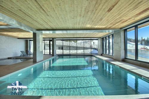 ARC 1600, LE RIDGE, Appartement 06 personnes Vue Montagne - ski aux pieds - Sauna, Hammam, Piscine, Arc 1600