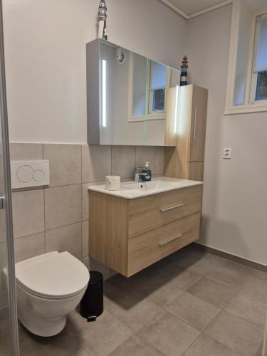 Vannas istaba, Gemütliche Ferienwohnung am Fjord (Gemutliche Ferienwohnung am Fjord) in Sørbøvågen