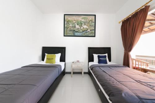 OYO 2548 Rasa Sayang Inn Room Type - Standard Twin Room